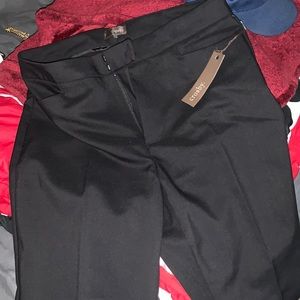 Higher waisted black pants.